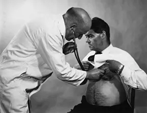 Medical Print: Doctor Listening to Heartbeat, 1960s