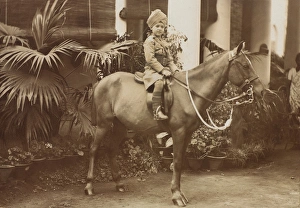 Child mounted and dressed in Indian Cavalry Uniform Child mounted and dressed in Indian Cavalry Uniform