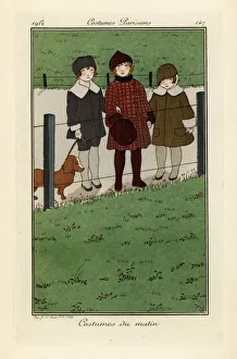 Children in hats and coats with a dog Children in hats and coats with a dog
