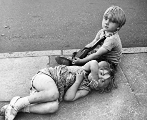 Two children on pavement, Balham, SW London Two children on pavement, Balham, SW London