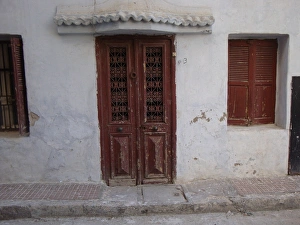 Close up of rustic door and window in Rabat Close up of rustic door and window in Rabat