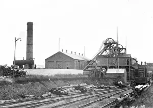 Prints of Coal Mines, Coalisland, Co. Tyrone - a view of the coal mine buildings beside a railway track. (Location: Northern Ireland; County Tyrone; Coalisland). Date: circa early 1900s Tyrone Prints: Coal Mines Print, Coalisland, Co. Tyrone, circa early 1900s