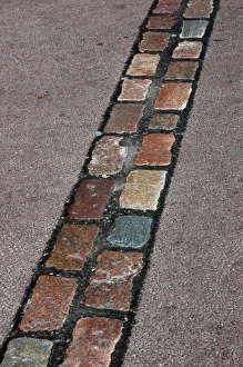 Cobblestones line that marks the place where was the Berlin Cobblestones line that marks the place where was the Berlin
