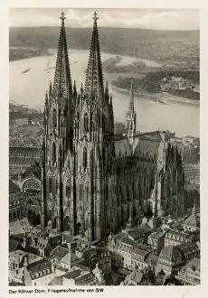 Prints of A fine elevated view of the magnificent Cologne Cathedral, taken in the years leading up to World War Two Related Prints: Cologne Cathedral Elevated View Print, 1930s