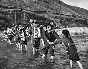 Communist China - communication team in water Communist China - communication team in water