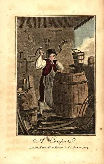 Cooper hammering a metal hoop on a hogshead barrel Cooper hammering a metal hoop on a hogshead barrel