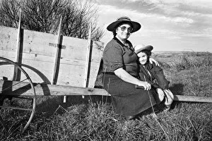 Viana Collection: Country woman and child. Portugal