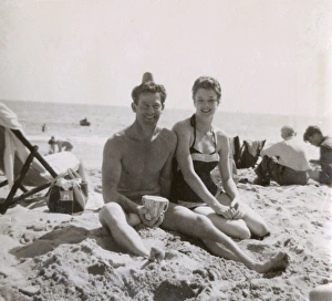 Couple on the beach at Bournemouth - early 1960s Couple on the beach at Bournemouth - early 1960s