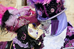 Couple wearing Venice Carnival Costumes Couple wearing Venice Carnival Costumes