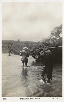 Crossing a river, Mombasa, Kenya, East Africa Crossing a river, Mombasa, Kenya, East Africa