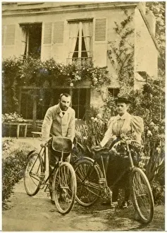Prints of MARIE AND PIERRE CURIE The two scientists set out on a Sunday afternoon cycle ride Marie Curie Prints: Marie and Pierre Curie Print: A photograph of the couple on bicycles