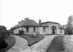 Prints of Deramore, Bessbrook, Co. Armagh - a view of a partly thatched mansion. (Location: Northern Ireland; County Armagh; Bessbrook). Date: circa early 1900s Armagh Prints: Deramore, Bessbrook Print - Early 1900s