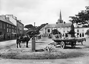Prints of The Diamond, Donegal - a view of the square in Donegal town with horse and donkey and carts. (Location: Republic of Ireland: County Donegal: Donegal). Date: circa early 1900s Related Prints: Donegal Town Print: The Diamond, Early 1900s