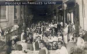 Dining families at Alfi Bey Street, Cairo Dining families at Alfi Bey Street, Cairo