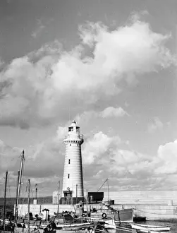 Prints of The lighthouse on the pier at Donaghadee, a popular summer holiday resort in County Down, Northern Ireland. Date: 1950s Northern Ireland Prints: Donaghadee Lighthouse Print, Northern Ireland, 1950s