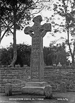 Prints of Donaghmore Cross, Co. Tyrone - a view of a High Cross. (Location: Northern Ireland: County Tyrone: Donaghmore). Date: circa early 1900s Tyrone Prints: Early 20th-Century Print of Donaghmore Cross, Co. Tyrone