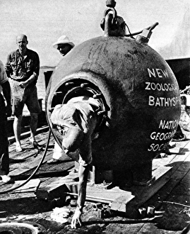 Dr. Beebe climbing out of his bathysphere, August 1934 Dr. Beebe climbing out of his bathysphere, August 1934