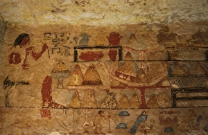 Egyptian Art. Deceased seated next to the offerings table. R Egyptian Art. Deceased seated next to the offerings table. R