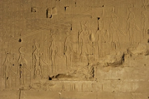 Egyptian Art. Dendera. Temple of Hathor. Deity in procession Egyptian Art. Dendera. Temple of Hathor. Deity in procession