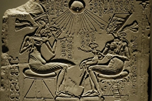 Egyptian art. Relief depicting Akhenaten, Nefertiti and thre Egyptian art. Relief depicting Akhenaten, Nefertiti and thre