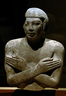 Egyptian Art. Upper Part of a statue representing a man call Egyptian Art. Upper Part of a statue representing a man call