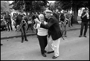 Elderly couple dancing at italian festa Elderly couple dancing at italian festa