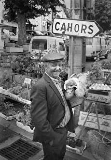 An elderly Frenchman in a market in Montaigu-de-Quercy An elderly Frenchman in a market in Montaigu-de-Quercy