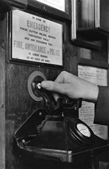 Emergency call button in telephone box Emergency call button in telephone box