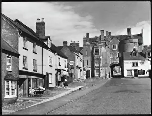 Prints of Broad Gate, Ludlow, Shropshire, the last of seven gates in the old city walls. The town is on the Welsh borders and played a great part in the Marches history Shropshire Prints: Broad Gate, Ludlow Print: A 1950s Image of the Last Remaining City Gate