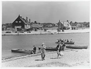 Prints of Narrowing down from the harbour, the River Avon passes through The Race at Mudeford, Dorset, England and then goes on to the sea Avon Prints: Mudeford Harbour Print, England 1940s