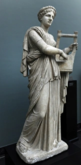 Erato. Statue of Muse of lyric poetry playing the zither Erato. Statue of Muse of lyric poetry playing the zither
