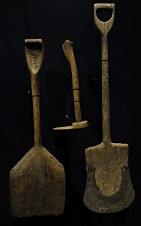 Farm tools. Wooden spade and wodden potato hoe. The National Farm tools. Wooden spade and wodden potato hoe. The National