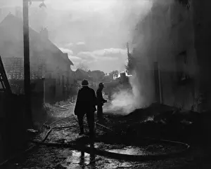 Historical Firefighting Images Prints: Firefighters in action at a fire, Exminster, Devon