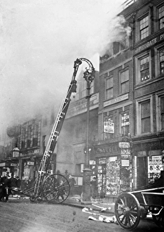 Firefighters attending a fire in the Strand in London Firefighters attending a fire in the Strand in London