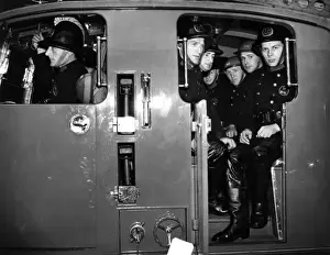 Wartime London Fire Brigade Prints: Firefighters in a fire engine, WW2