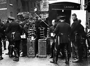 Firefighters At Work Prints: Firefighters on refreshment break, Wapping, East London