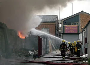 Firefighters at scene of commercial premises fire Firefighters at scene of commercial premises fire