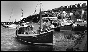 Fishing boats in Mevacissey harbour Cornwall UK Fishing boats in Mevacissey harbour Cornwall UK