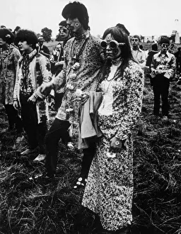 Prints of HIPPIES His and Hers Flower Power outfits at the great Love-In at Woburn Park, Bedfordshire, England. Date: August 1967 Bedfordshire Prints: Flower Power Print: Love-In at Woburn Park, August 1967