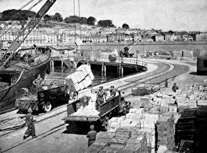 Food being unloaded in the Channel Islands; Second World War Food being unloaded in the Channel Islands; Second World War