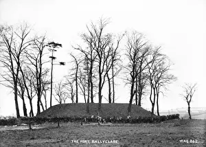 Prints of The Fort, Ballyclare - a view of an earthen mound with trees around it. (Location: Northern Ireland: County Antrim: Ballyclare). Date: circa early 1900s Map Prints: The Fort, Ballyclare Print - Early 1900s