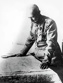 Prints of Aleksei Brusilov (1853 1926), Russian general in World War One, looking at a map with a magnifying glass to aid him Generals And Leader Prints: General Alexei Brusilov Study Print, 1917
