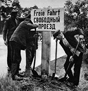 German Workers Re-erecting a Free Passage Sign, Berlin, 19 German Workers Re-erecting a Free Passage Sign, Berlin, 19