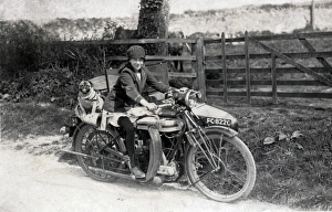 Girl & dog on a 1921 Triumph SD motorcycle & sidecar Girl & dog on a 1921 Triumph SD motorcycle & sidecar