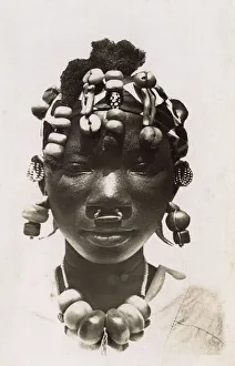 Girl from Mali with wonderful beads and headdress Girl from Mali with wonderful beads and headdress