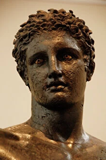 Archaeological Collection: Greek Art. Greece. 4th century BCE. Bronze statue of a youun