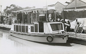 Group of people on motor boat named St. Martinus Group of people on motor boat named St. Martinus