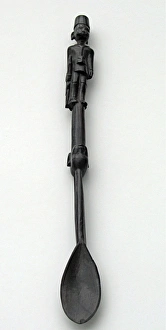Hand-carved WWI African Black Wood Askari soldier - spoon Hand-carved WWI African Black Wood Askari soldier - spoon
