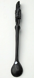 Hand-carved WWI African Black Wood Askari soldier - spoon Hand-carved WWI African Black Wood Askari soldier - spoon