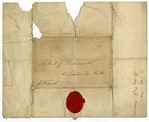 Handwritten address on a letter with red sealing wax Handwritten address on a letter with red sealing wax